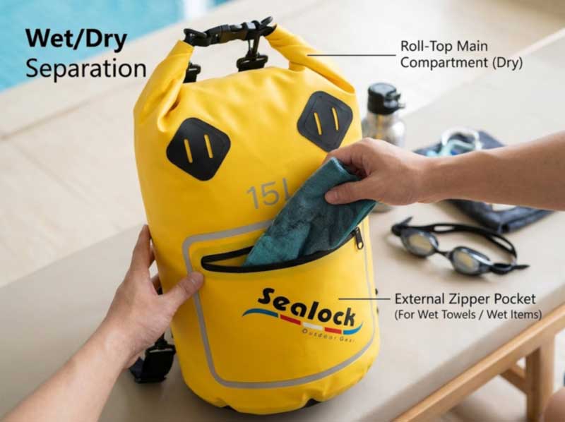 Tube wet dry bag with sealed roll-top main chamber and external zip pocket holding a wet towel